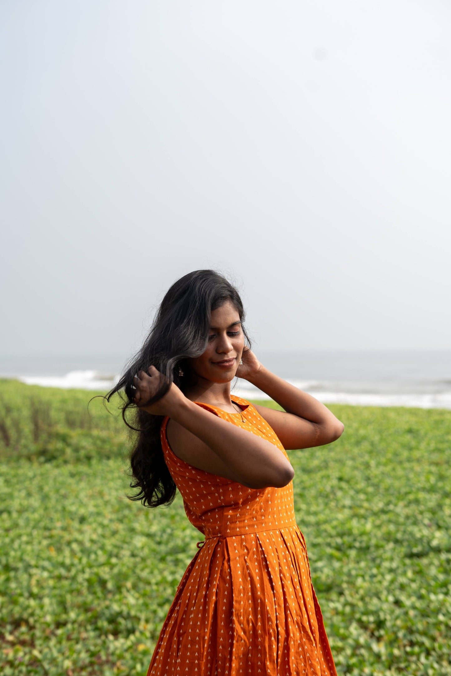 Vibrant orange sleeveless dress