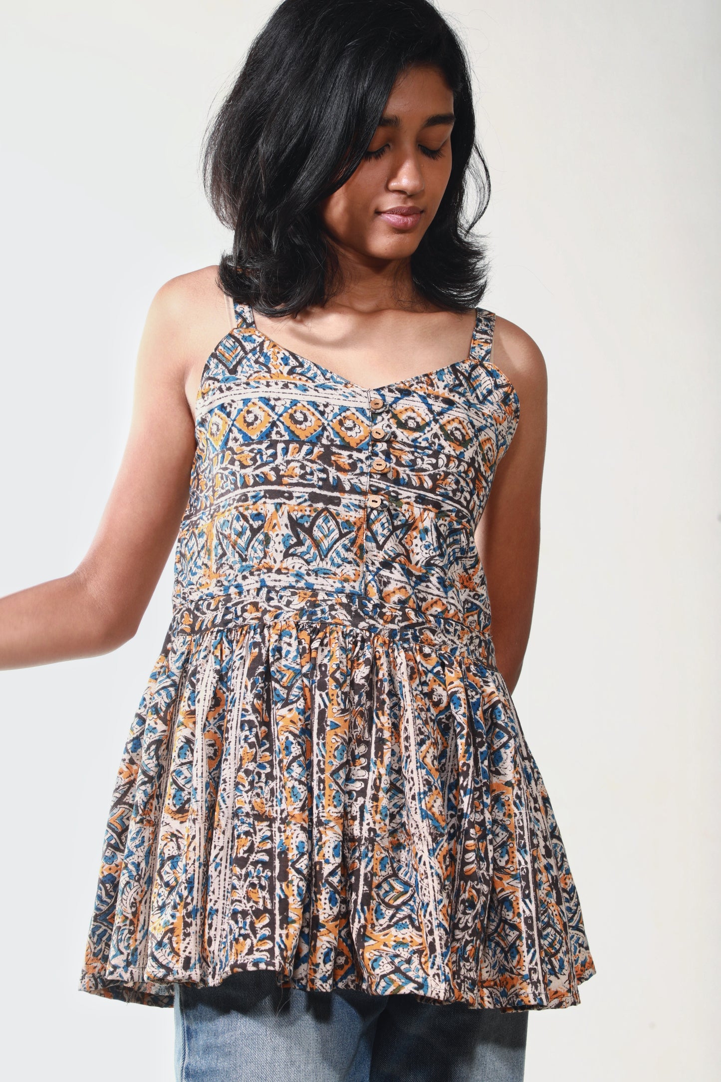 Vibrant Essence Sleeveless Peplum Top