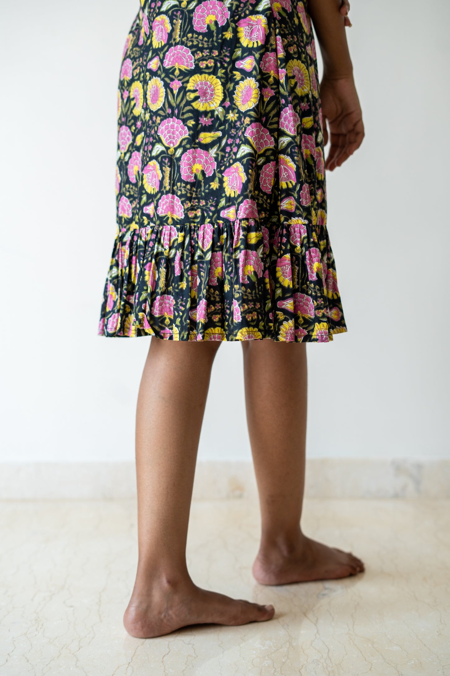black floral sleeveless dress